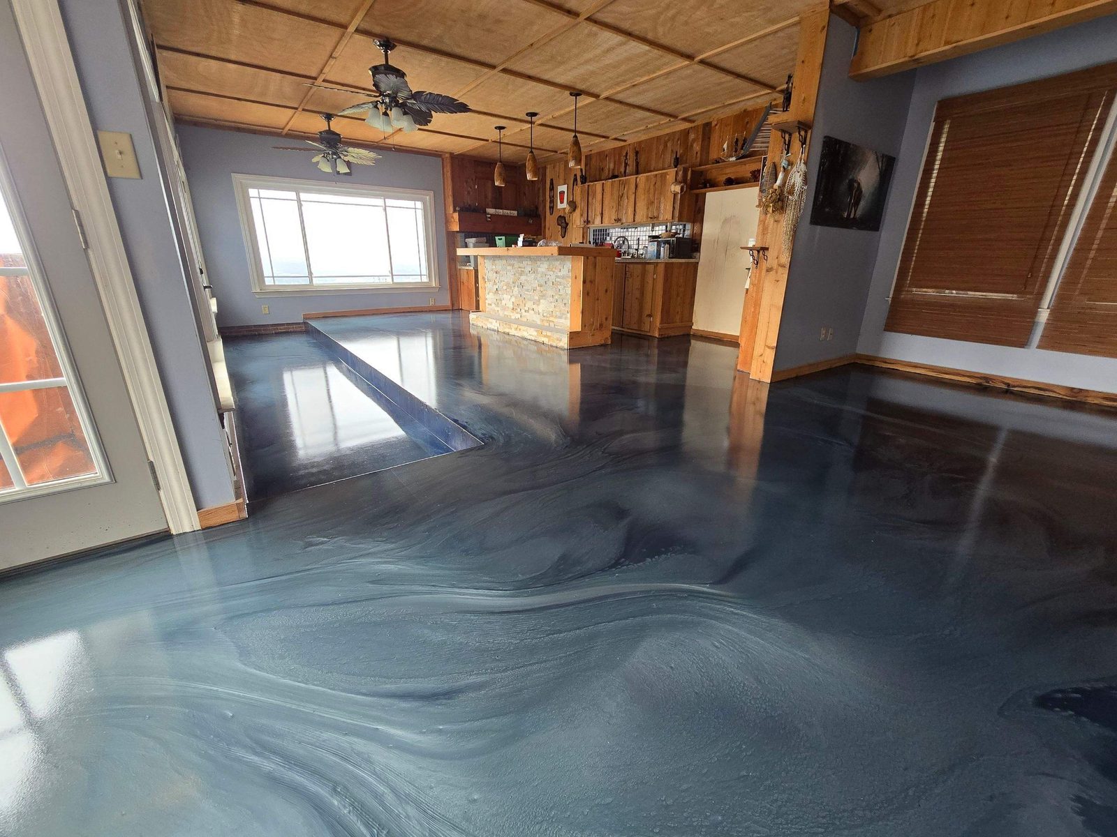 Blue metallic epoxy kitchen floor